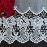 Delicate white curtain with guipure floral pattern 