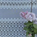 Stylish elegant curtain with white guipure ornamental pattern 